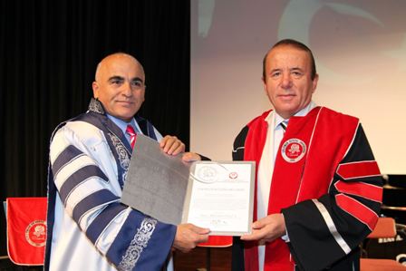 SDÜ'den Vali Memduh Oğuz'a Fahri Doktora Ünvanı Verildi