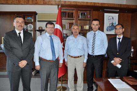 VAKIFBANK YETKİLİLERİNDEN ÖZMERAL'E NEZAKET ZİYARETİ